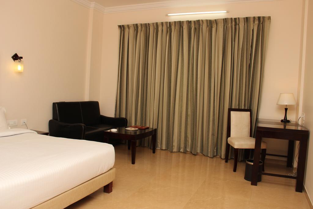 Quality Inn Palms Gāndhīdhām Quarto foto